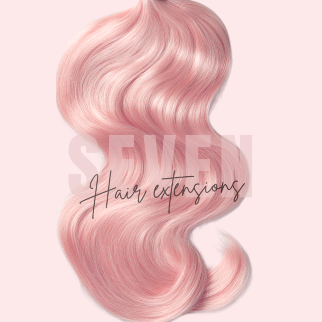 Pink hair extensions with 'SEVEN hair Extensions' branding on a light pink background showcasing that you can custom color your blonde bundles!