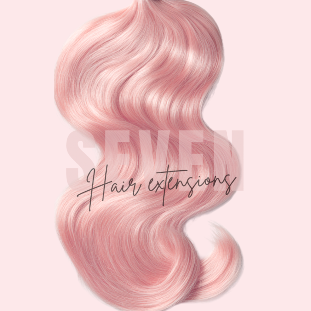 Pink hair extensions with 'SEVEN hair Extensions' branding on a light pink background showcasing that you can custom color your blonde bundles!
